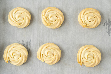 Homemade simple white chocolate cookies in baking tray