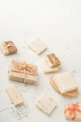 variety of natural soap bars on a white background