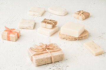 variety of natural soap bars on white background
