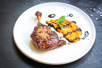 duck leg confit meat
portion of prepared food
Menu concept serving size. food background top view copy space for text
organic healthy eating