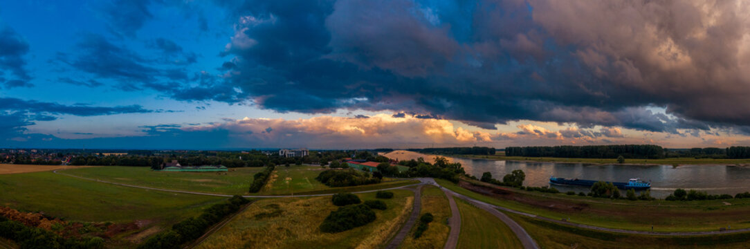 Storm clouds over the Rhine near Monheim and Leverkusen, Germany.