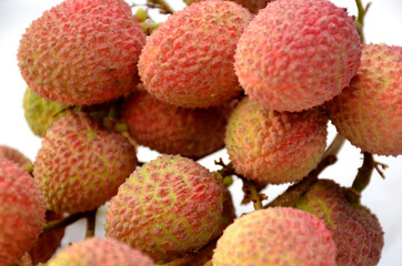 bunch the red ripe lychee isolated on white background.