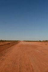 Fototapeta na wymiar A strip of dirt road north of Menindee in Australia