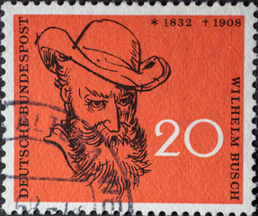 GERMANY - CIRCA 1958: This postage stamp shows the author Wilhelm Busch. The occasion is the 50th...