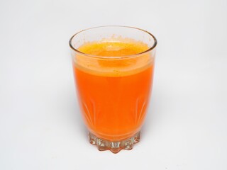 Carrot juice isolated on white background