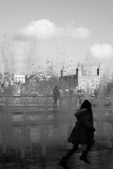 Girl having fun in fountains, london southbank