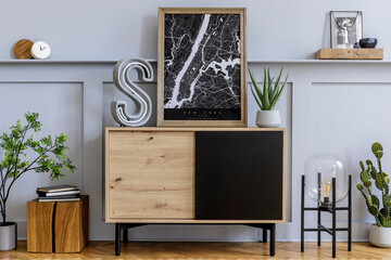 Modern scandinavian home interior with mock up poster frame, design wooden commode, big cement letter, cacti, plants, decoration, shelf and personal accessories in stylish home decor.