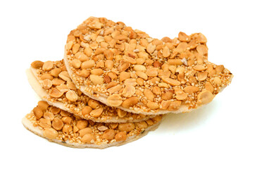 Honey bars with peanuts, sesame and sunflower seeds isolated