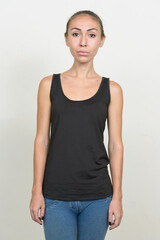 Portrait of young woman with brown hair