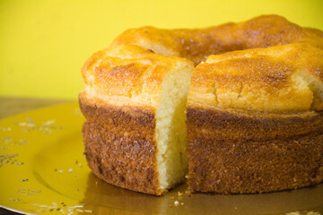 Rice cake on golden tray and yellow background