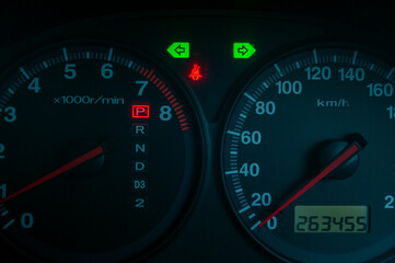 Black speedometer from a close-up car and symbol inside the screen