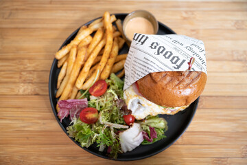 nice burger with salad and chips