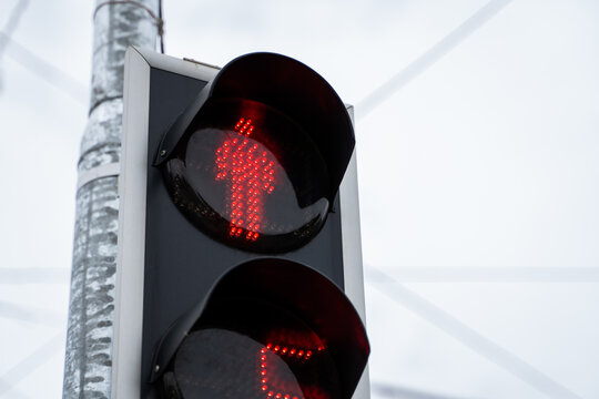 Red Trafic Light In The City In A Daylight.