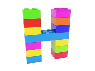 The letter H is composed of toy bricks of different colors on white