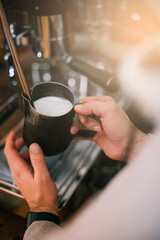 Fototapeta na wymiar Making a latte coffee