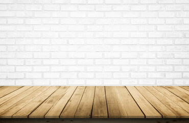 Empty wooden table top on white brick wall background, Design wood terrace white. Perspective for show space for your copy and branding. Can be used as product display montage. Vintage style concept.