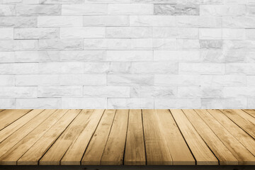 Empty wooden table top on white brick wall background, Design wood terrace white. Perspective for show space for your copy and branding. Can be used as product display montage. Vintage style concept.