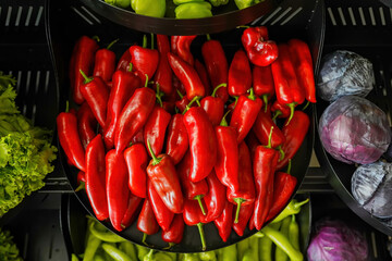 Bunch of organic red pepper on a market, background