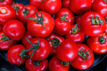 Beautiful selected organic tomatoes background, ripe red and sweet tomatoes