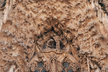 Sculptures and statues on the facade of the Sagrada Familia building.