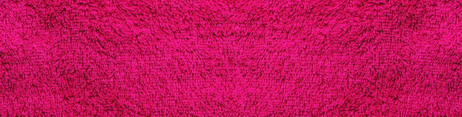 Purple fabric texture pattern. Cloth design of terrycloth towel, bathroom item close up detail. Empty soft towel surface background