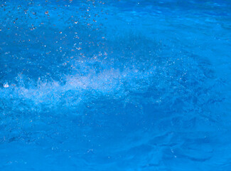 A splash of water. Splashes of blue water.