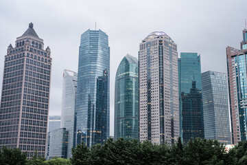 Fototapeta na wymiar Modern skyscrapers in Lujiazui, financial district in Shanghai, China.