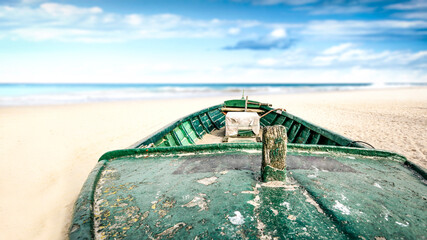 Summer boat on beach and free space for your decoration. 
