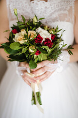 the bride's bouquet, bride holding bouquet, wedding day, bride in wedding dress, morning bride