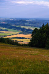 Fototapeta na wymiar Panorama of Czech Paradise with castle Trosky, view from Kozakov hill.