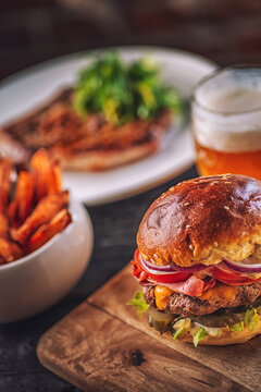 american hamburger with glass of beer in american restaurant or pub, product photography for restaurant in american style