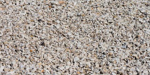 Crushed stone on a building site. Building material for road construction and paths