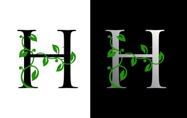 Elegant H Letter Icon with luxury green leaf logo design.