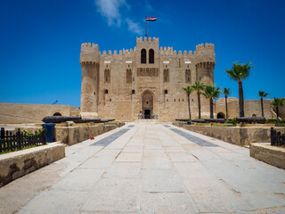 the front of the quaitbay citadel in Alexandria in corona times with no too few tourists - obrazy, fototapety, plakaty