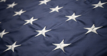 White American stars on blue usa flag. Close up shot.