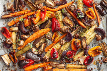 Colorful vegetables baked with spices and herbs