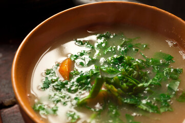 Vegetarian soup with greens.