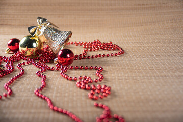 Christmas ornaments on a straw mat in a beautiful arrangement selective focus