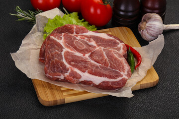 Raw pork neck steak