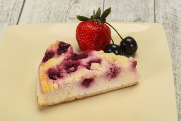 Cheesecake with cherry served strawberry