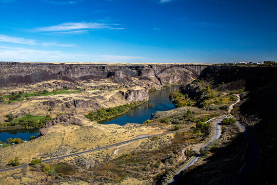The Snake River and  Perrine Bridge.  It is a truss arch span in the western United States, carrying traffic over the Snake River,  located at Twin Falls, Idaho.