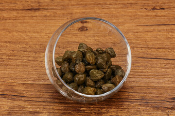 Tasty capers in the bowl