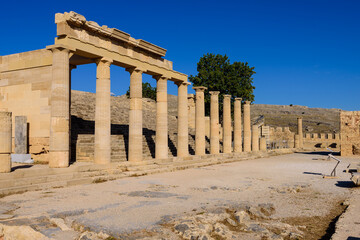 Obraz premium Sightseeing of Rhodes island. Ruins of ancient temple in Lindos, Rhodes island, Greece.