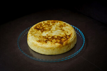 Slice of curd cake with banana