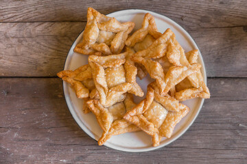 fried pastry with quince and batata typical of south america gastronomy