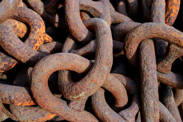 Rusty old chain ropes. Big rusty chains close-up