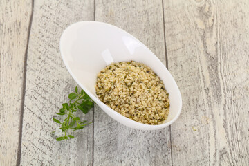 Peeled hemp seeds in the bowl