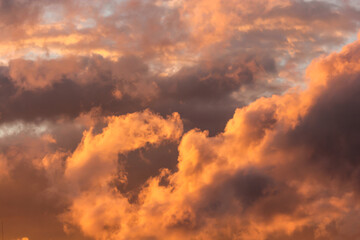 Clouds lit by the sun at sunset.
