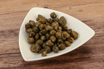 Tasty capers in the bowl