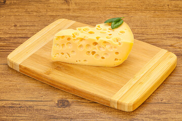 Maasdam cheese - yellow triangle with holes